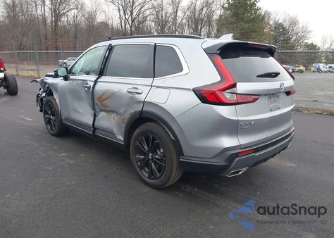 2025 Honda Cr-V Hybrid Sport Touring z USA, uszkodzony, nr VIN 2HKRS6H98SH820968